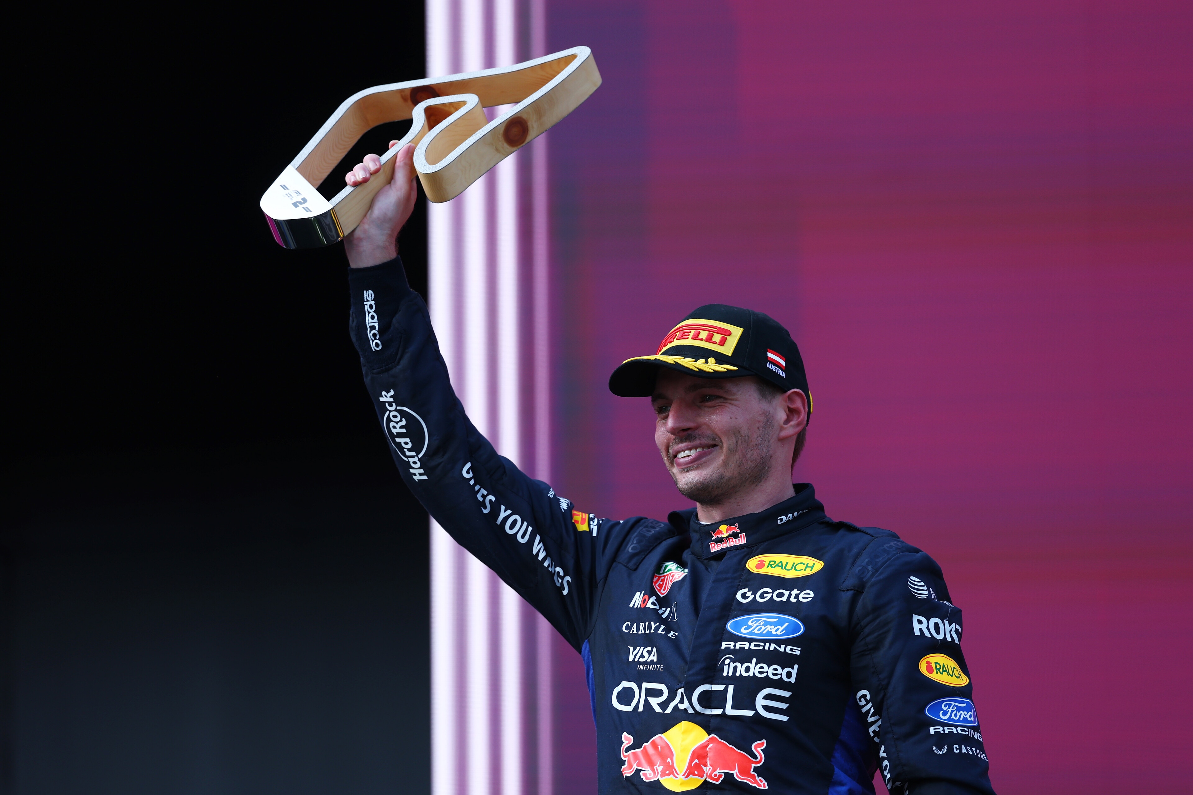 SPIELBERG, AUSTRIA - JUNE 28: Second placed Max Verstappen of the Netherlands and Oracle Red Bull Racing lifts his trophy on the podium during the F1 Grand Prix of Austria at Red Bull Ring on June 28, 2026 in Spielberg, Austria. (Photo by Clive Rose/Getty Images) // Getty Images / Red Bull Content Pool // SI202606280632 // Usage for editorial use only // 